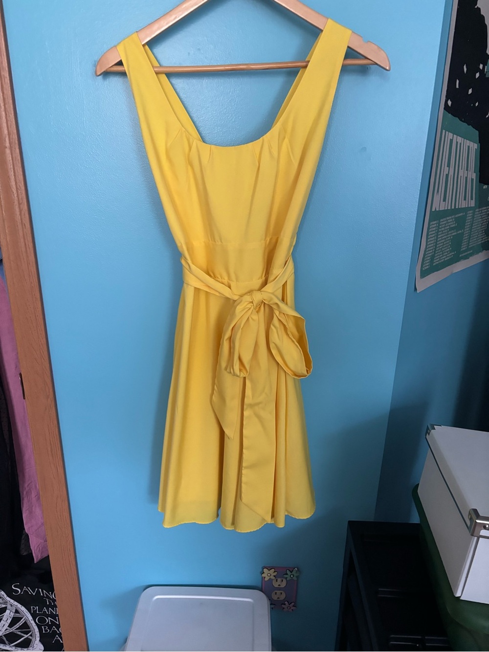 Yellow sleeveless Dress bought on Etsy size Small back is elastic